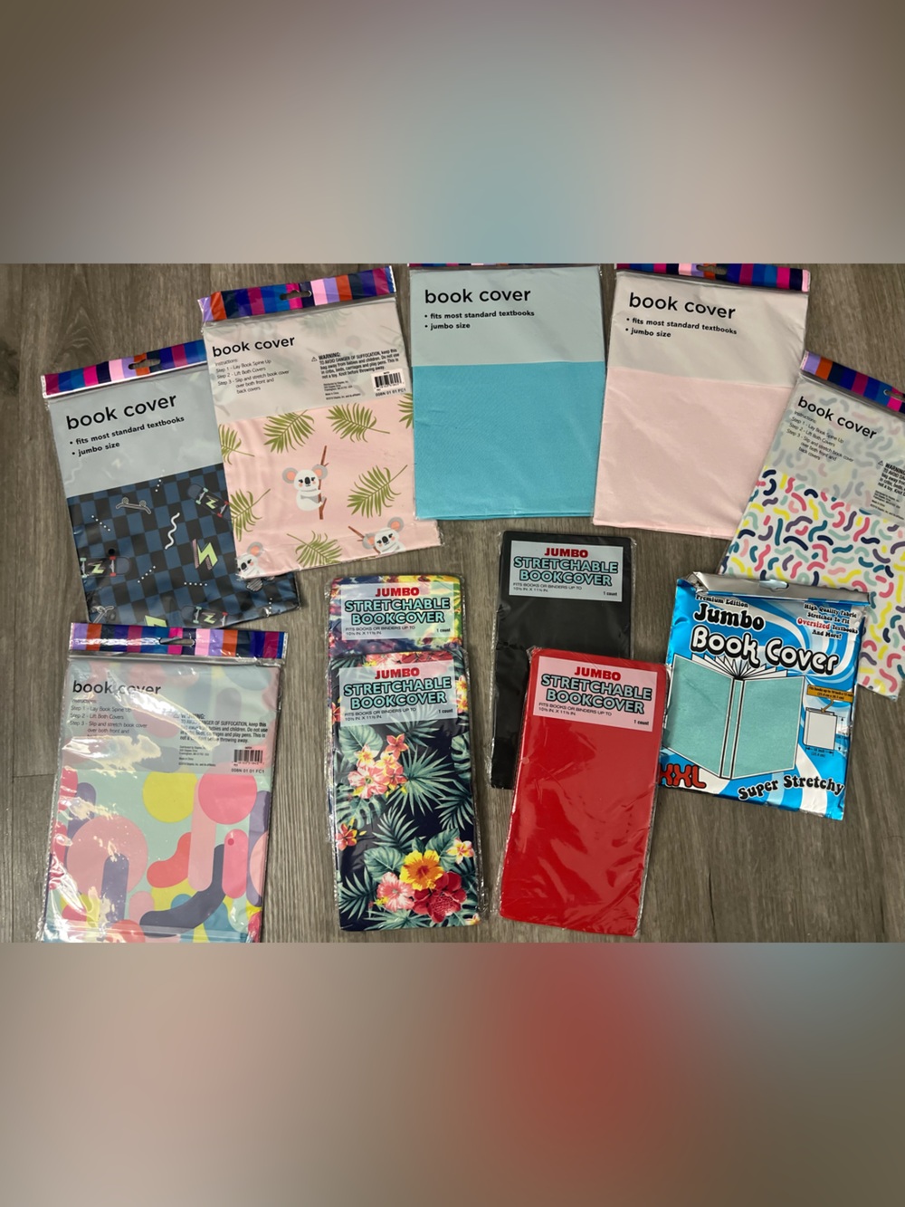 Assorted design Stretchable Book Covers qty 11  school/office supplies